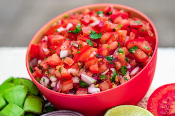 Tomato Salad mixed with red onion Mexican food homemade authentic style made from fresh healthy organic ingredient for vegan appetizer