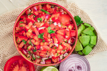 Tomato Salad mixed with red onion Mexican food homemade authentic style made from fresh healthy organic ingredient for vegan appetizer