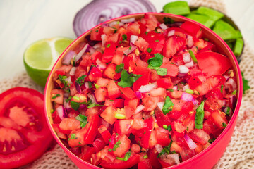 Tomato Salad mixed with red onion Mexican food homemade authentic style made from fresh healthy organic ingredient for vegan appetizer