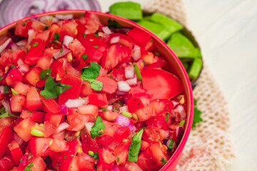 Tomato Salad mixed with red onion Mexican food homemade authentic style made from fresh healthy organic ingredient for vegan appetizer