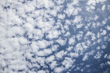 Fototapeta na wymiar Clouds on the blue sky. Background, texture.