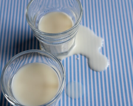 spilt milk on blue background 
