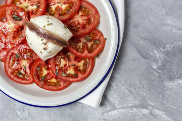 Healthy Homemade Tomato Salad with Mozzarella, Anchovies and Oregano