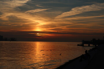 Fototapeta na wymiar Sunset by the ocean in Portugal