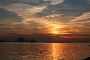 Naklejka premium Sunset by the ocean in Portugal