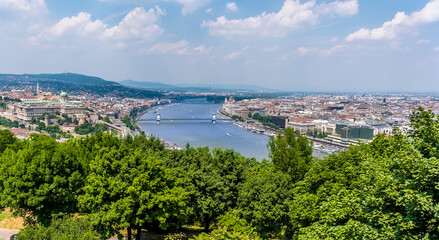 Fototapeta premium A panorama view of the River Danube in Budapest from the Gellert Hill in the summertime
