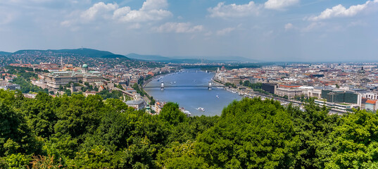 A panorama view of Budapest and the River Danube from the Gellert Hill in the summertime