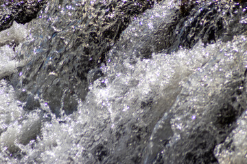 water flowing from the rocks