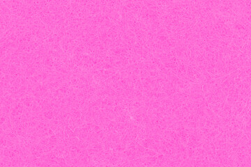 Bright pink felt textured fabric closeup background