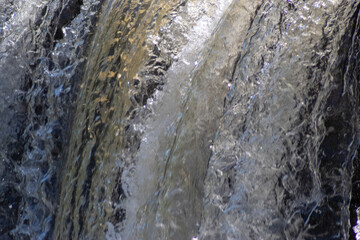 water flowing over rocks