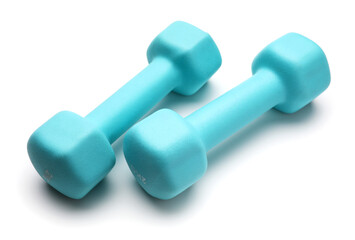 Two turquoise colored rubber dumbbells lying at white table