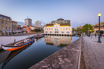 Sunset view of downtown Aveiro with its river and classic boats in Portugal