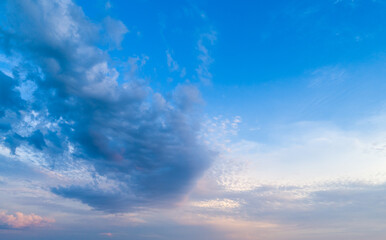 Obraz premium Sunset sky with multicolor clouds