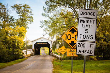 Road signs before bridge