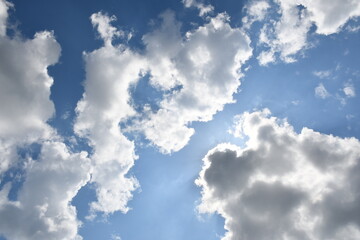 Beautiful white fluffy clouds on a blue sky