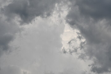 Dark and white fluffy clouds in the sky