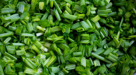 Fresh sliced green onions for salad, okroshka, soup.