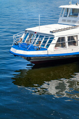 The bow of the ship. Fragment of the hull of a river pleasure boat. Water transport.