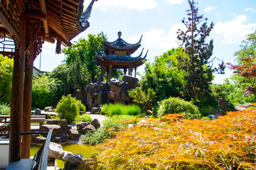 Scenic view of a beautiful Chinese-style pavillon in the Chinese Garden in the city of Stuttgart,...