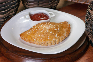 Brazilian snacks, roasted pastel on white background