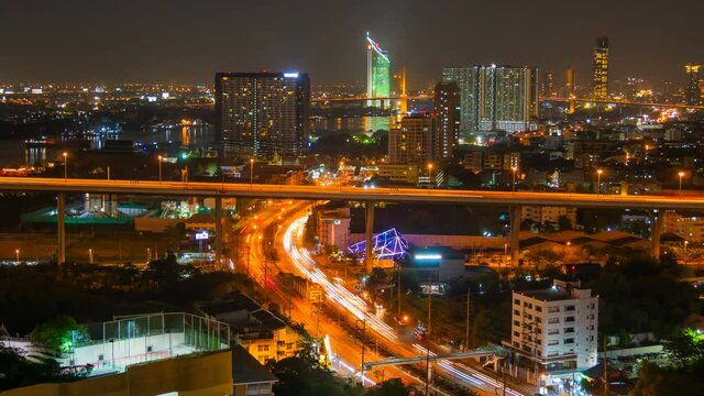 time lapse of Bangkok city view and traffic road at night, Thailand