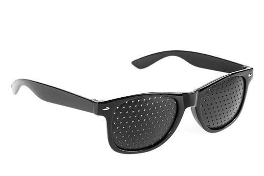 Perforated glasses isolate on a white background. Special glasses with holes for vision, pinhole glasses.