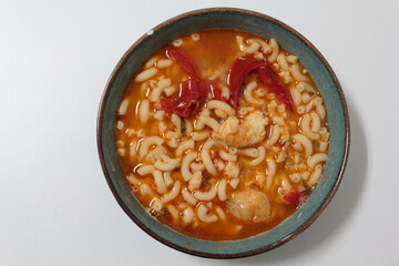 Bowl with Fish pasta soup. A Portuguese typical dish called massada de peixe