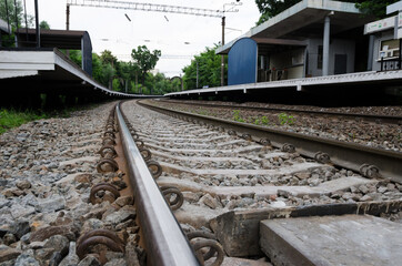Old rails in the landscape. Rails on the ground.