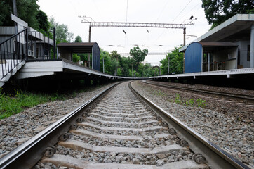 Old rails in the landscape. Rails on the ground.