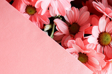 postcard mockup. floral background. bouquet of flowers and an envelope with place for text. bouquet of daisies