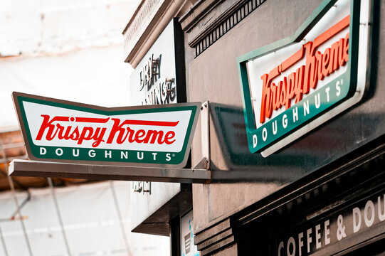 London, England - June 09, 2010; Krispy Kreme Doughnuts Sign, Krispy Kreme Doughnuts, Inc is an American company formed in 1937.