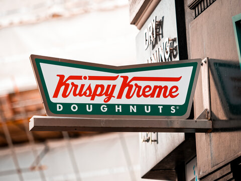 London, England - June 09, 2010; Krispy Kreme Doughnuts Sign, Krispy Kreme Doughnuts, Inc is an American company formed in 1937.
