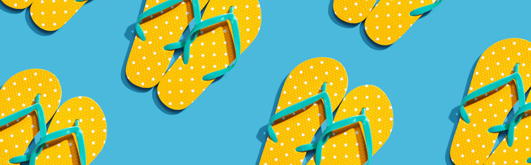 Summer concept with flip flops overhead view - flat lay