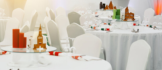 Catering. Served tables. Stylized as Russia with the Kremlin, Italy with the Colosseum and Egypt with pyramids.