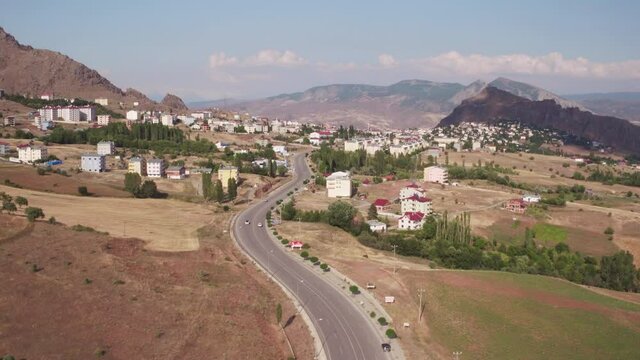 Sebinkarahisar city in north center Turkey in drought mountains landscape.  Aerial drone wide view at summer sunny day