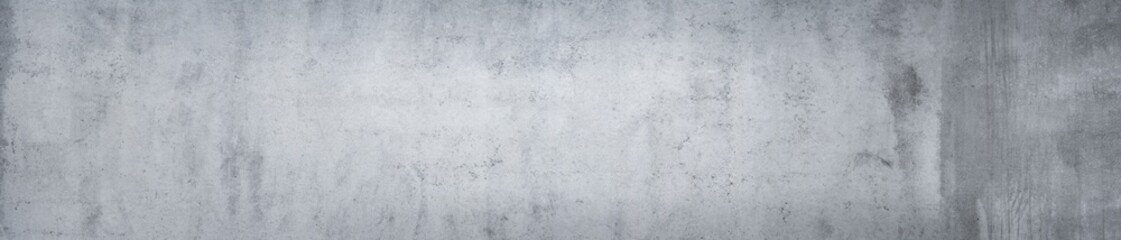 Panorama of an old grungy cement wall as background or texture