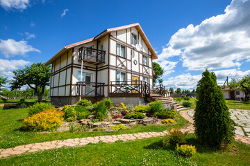 Traditional half timbered german house. Landscape view. Beautiful entrance area.