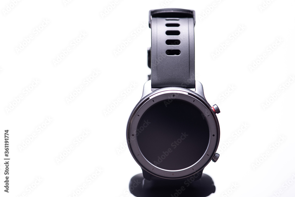 Wall mural wireless round, dark smart watch isolated on a white background