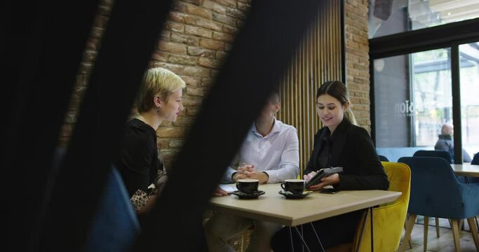 Business people enjoy and work in a cafe, business meeting in cafe