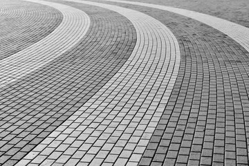 Circle tile road. Stone pavers in city park