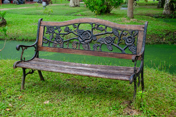 park bench with flower pattern and old wood