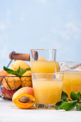 Apricot juice in glass. Healthy drink