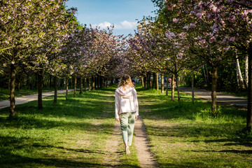 young woman walking in the park