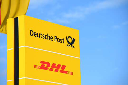 Buchholz, Lower Saxony / Germany - March 24, 2019: Logo Of Deutsche Post And DHL In Buchholz, Germany - Deutsche Post DHL Is The World's Largest Logistics Company Headquartered In Bonn