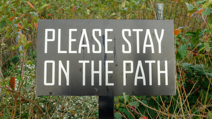 Please stay on the path - sign
