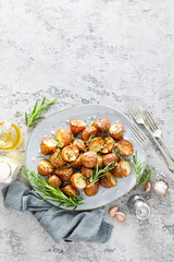 Baked potatoes with rosemary, thyme and garlic