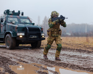 machine gun in his hands