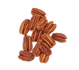 heap of peeled pecans isolated on a white background