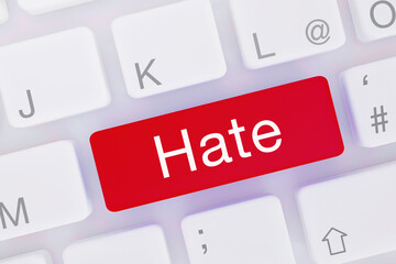 Fototapeta premium Hate. Computer keyboard from above showing key with word highlighted blue. Software, internet, program