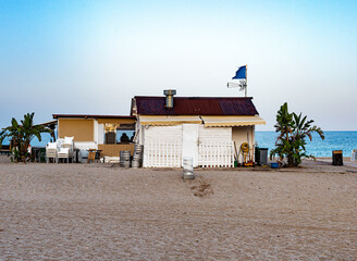 Beach scene in Miami Platja, Spain. - 361204704